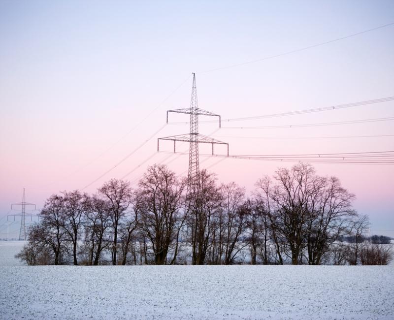 Electricity transmission pillars in winter with snow