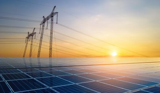 Electricity transmission towers and solar panels